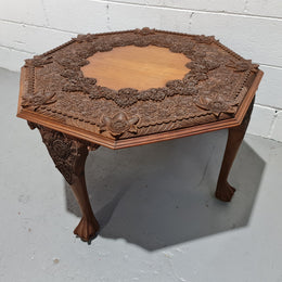 Heavily carved Teakwood round Chinese coffee table. In good original detailed condition. Circa: 1920