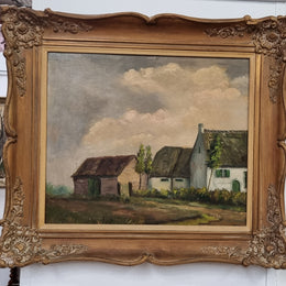 French signed oil on canvas depicting farmhouse in a lovely gilt frame. It is in good original detailed condition and has been sourced from France.