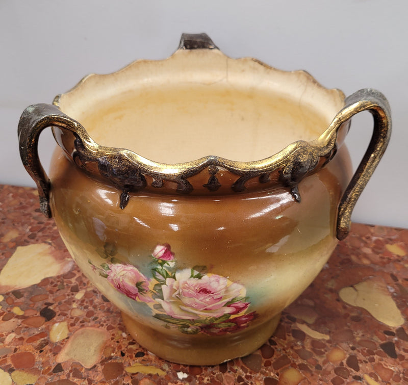 Pretty Antique three handled floral jardinière. Please note that it is being sold in as found condition, please view photos as they help form part of the description.