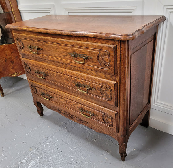 French Louis XV style Oak three drawer chest with wooden top. It has been sourced from France and is in good original detailed condition.
