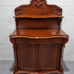 Beautiful Antique Victorian Mahogany two door Chiffonier. Plenty of storage space with one drawer and the two doors open up to a shelved area. It is in good restored condition.