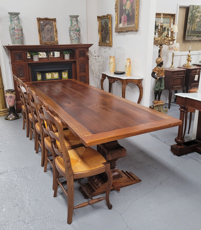 French style reclaimed Elm Farmhouse table with stretcher base and amazing carving underneath. Table can sit 10-12 people and is in good original detailed condition.