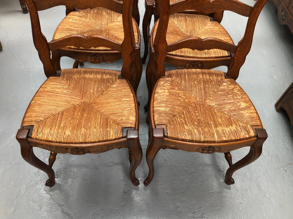 Set of six French rush seat dining chairs and in good sturdy condition.