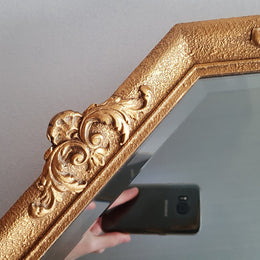 A beautiful Vintage octagon shape ornate gilt mirror, with bevelled glass and in good original condition.