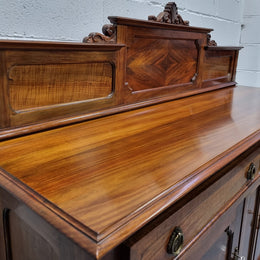 Fabulous Antique two door Blackwood and Fiddleback sideboard with lovely presence and also plenty of room for storage. In original detailed condition.