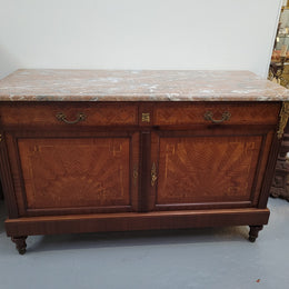 Louis 16th style Mahogany marble top cupboard and two drawers with decorative marquetry inlay and gilt bronze mounts. In good original detailed condition.