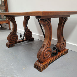 French Oak Spanish style stretcher base coffee table. Sourced From France and is in very good original detailed condition.