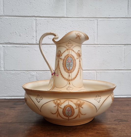 Charming large Crown Devon jug and basin set. Muted colors featuring garlands and floral medallions “Festoon Pattern” No chips or cracks in good condition commensurate with age