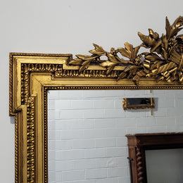 Substantial Louis XI style French Antique over mantel mirror. It is in very good restored condition.