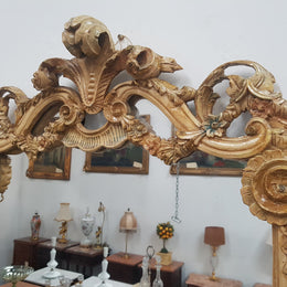Beautifully carved Italian Rococo style painted console/hall table and mirror. An amazing coloured marble top showing sections of gold veins and is in good condition. Mantle mirror is retaining it's original mirror and showing ages spots.