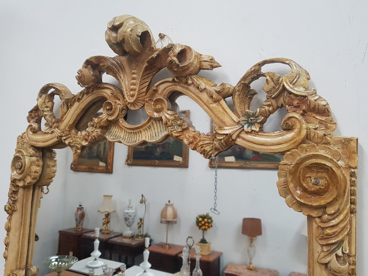 Beautifully carved Italian Rococo style painted console/hall table and mirror. An amazing coloured marble top showing sections of gold veins and is in good condition. Mantle mirror is retaining it's original mirror and showing ages spots.