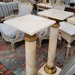 Pair of Imposing French alabaster marble and bronze pedestals. They are highly decorative and have been sourced from France. They are in good original detailed condition.
