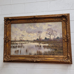 Sourced from France an impressionist oil painting of a beautiful lake scene. It is nicely framed in an Antique frame and in good original detailed condition.