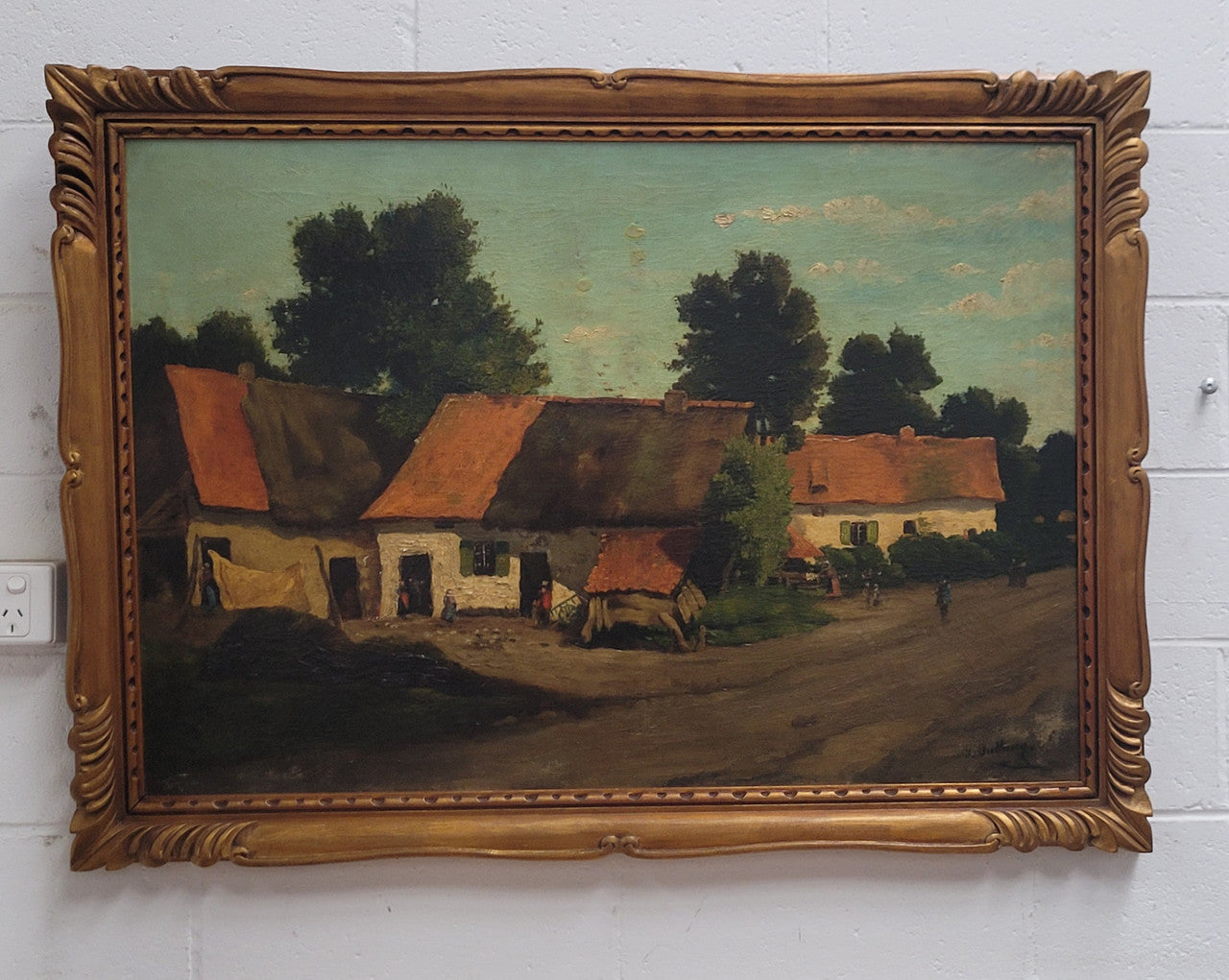 Fabulous signed French oil on canvas painting of a farmhouse scene in a beautiful Art Deco frame. It is in good original detailed condition.