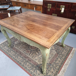 Beautiful 19th century French walnut dining table with a lovely painted green base. Sits 6 people comfortably.