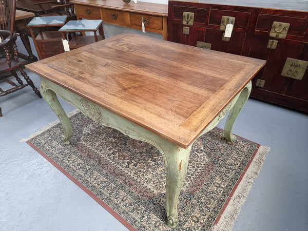 Beautiful 19th century French walnut dining table with a lovely painted green base. Sits 6 people comfortably.
