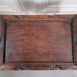 Chinese Rose wood occasional table. Nicely carved and could be used as a coffee table or and occasional table. It is in good original condition.