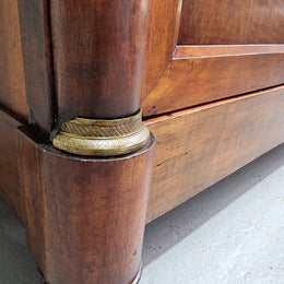 Grand French Mahogany Empire two door bookcase. It has beautiful glass doors and has three fully adjustable shelves. It has been sourced from France and is in good original detailed condition.
