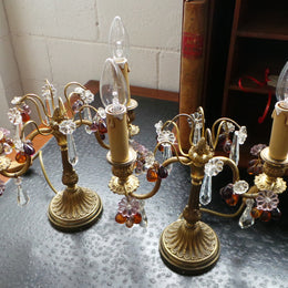 A stunning pair of French Bronze gilt Girandole candelabras, with lovely quartz drops. They are 36 cm tall and have been rewired to Australian standards. They are in very good original condition.