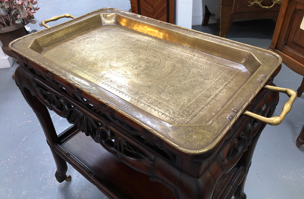 Victorian Rosewood auto/drinks trolley with a very decorative removable brass tray. In very good original detail condition.