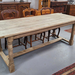 Beautilful raw solid oak French pedestal extension table. It has been sourced from France and is in good original detailed condition. When the table is fully extended it is 339 cm long and can comfortable seat 10-12 people. Features raw wood that could be used as is for a distressed look, or finished and waxed for a more refined look.