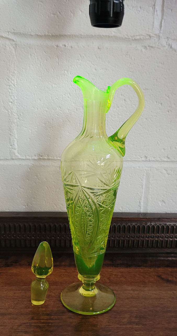 Stunning Uranium glass decanter and stopper. Great shape and height of 30.5cm