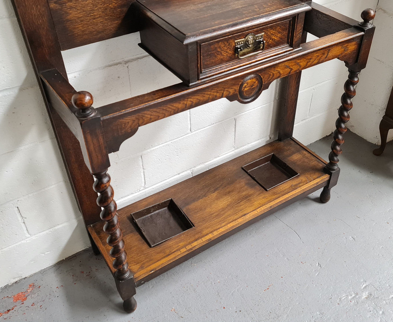 Beautiful Oak Antique Jacobean hall stand, with barley twist leg and a drawer for storage in very good original detailed condition condition.