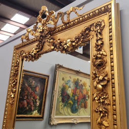 Stunning Vintage French floral gilt framed overmantel mirror. It has been sourced from France and is in good original detailed condition.