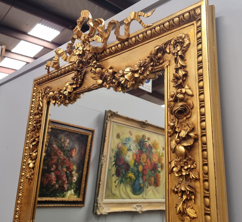 Stunning Vintage French floral gilt framed overmantel mirror. It has been sourced from France and is in good original detailed condition.