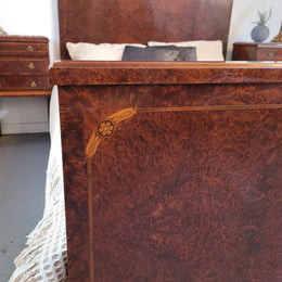 French Art Deco bedroom suite consisting of queen size bed in Amboyna wood and featuring pretty inlay. It comes with a matching pair of bedsides. It is a very stylish and high quality suite. It has been sourced from France and is in good original detailed condition.