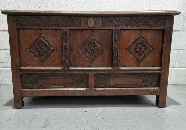 Early 19th Century French Oak carved coffer with a lift up lid for storage. A beautiful piece and in good original condition.