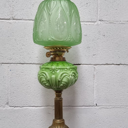 Beautiful Victorian green banquet lamp. It is in good condition, shade looks to be a later. It has been sourced locally.