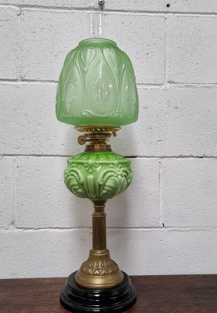 Beautiful Victorian green banquet lamp. It is in good condition, shade looks to be a later. It has been sourced locally.