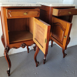 Pair of Louis XV style Walnut bedside cabinets marble top. Circa 1900 and in good original detailed condition.