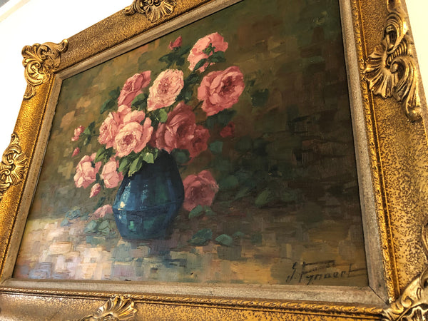 Beautifully framed signed, French oil on canvas of a vase of Pink roses and in good condition.