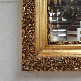 A stunning French 19th century gilded wall mirror in good original condition.