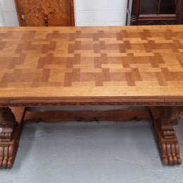 Amazing French Oak Renaissance style parquetry top extension table. Beautiful parquetry top and amazing detailed carvings on the legs. It extends to 306 cm long when fully extended. Sourced from France and in good original detailed condition.