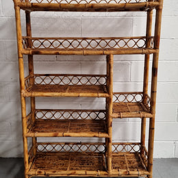 Vintage Tortoiseshell Bamboo Shelves.  Good size unit with irregular shelves. It is in good original condition and it very solid.