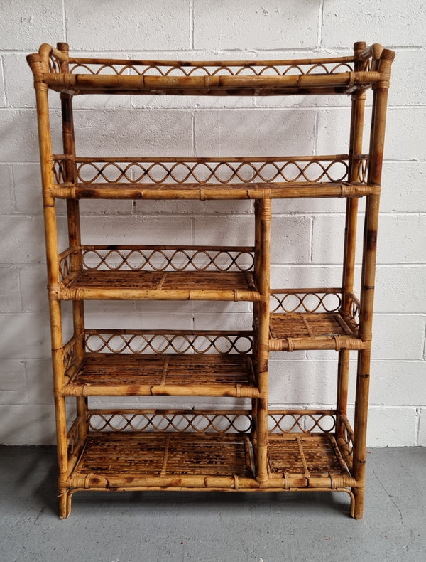 Vintage Tortoiseshell Bamboo Shelves.  Good size unit with irregular shelves. It is in good original condition and it very solid.