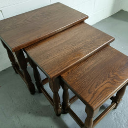 Vintage nest of three French Oak tables. In very good original detailed condition.