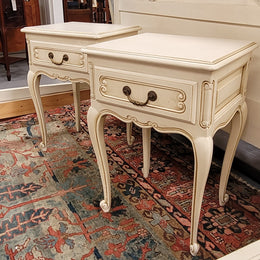 Pair French Vintage Louis XV style soft Ivory single drawer bedside tables. They have been sourced from France and are in good original condition.