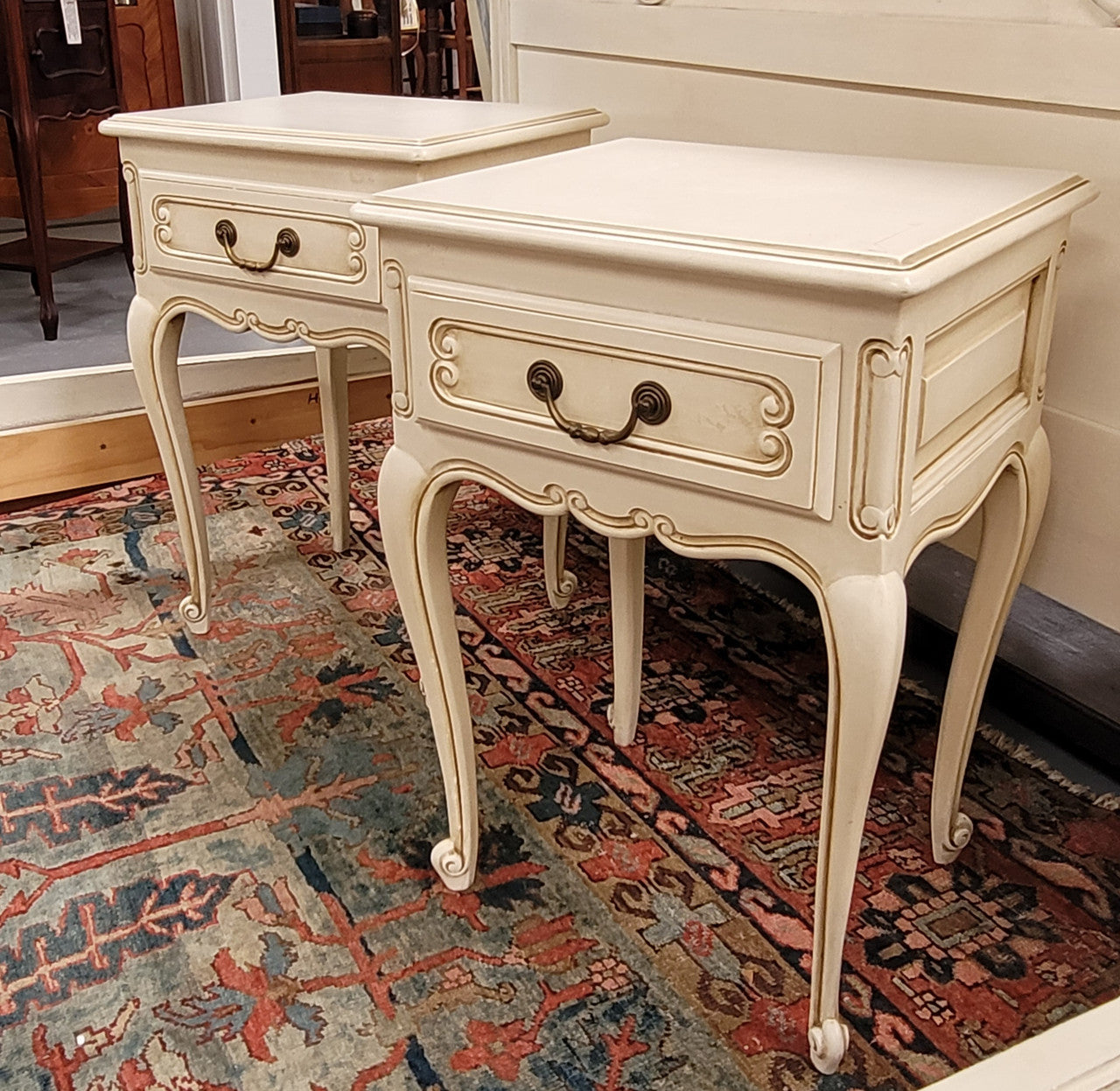 Pair French Vintage Louis XV style soft Ivory single drawer bedside tables. They have been sourced from France and are in good original condition.