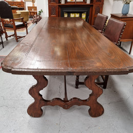 Amazing hard to find French Fruitwood Spanish style 3 meter dining table. Decorative iron work underneath and in good detailed original condition.