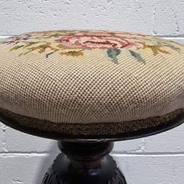 Beautiful Late Victorian Floral tapestry covered revolving piano stool. It is in very good original detailed condition. It has a original David Jones label underneath .