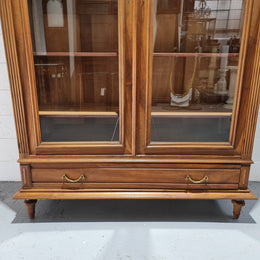 Stunning French Henry II style Walnut two door bookcase. In good original detailed condition.