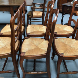 Antique set of six French Cherrywood rush seat dining chairs. In good original detailed condition.