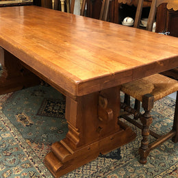 French Farmhouse table with a beautiful thick plank top and stretcher base. Can seat 8-10 people comfortably and is in good original detailed condition.