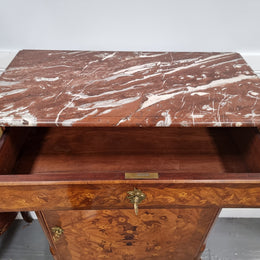 Elegant French transitional style Walnut & Kingwood Salon cabinet. It has beautiful marquetry inlay, a marble top and decorative ormolu mounts. Sourced From France and is in good original detailed condition.