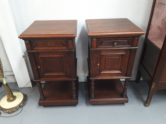 A hard to find pair of French Oak wooden top bedside cabinets. In good original condition. Circa 1920.