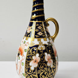 Royal Crown Derby Vase in good original condition. Please see photos as they form part of the description.
